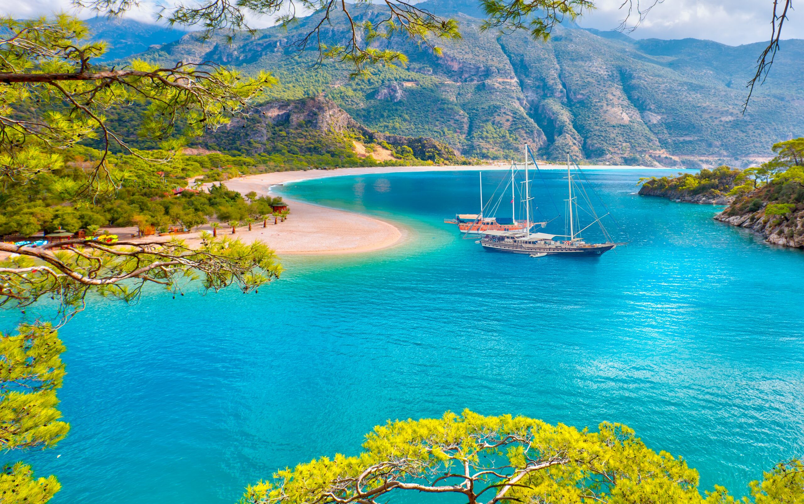 Black,And,Brown,Gulet,Anchored,At,The,Aegean,Sea,