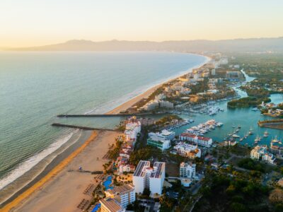 Aerial,View,Of,Nuevo,Vallarta,At,Sunset,Showing,The,Beach,