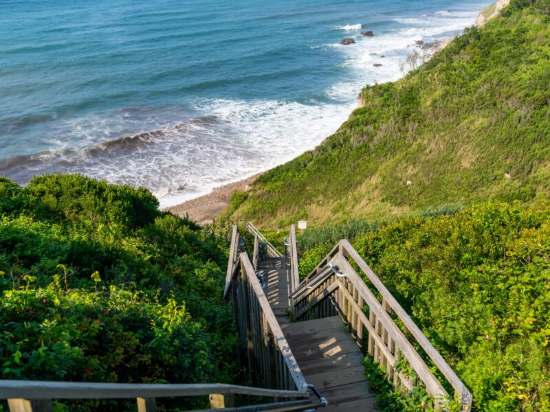 Wooden,Staircase,Leading,Down,To,The,Beach,At,Mohegan,Bluffs,